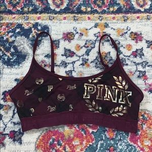 Victoria’s Secret maroon and gold sports bra